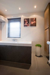 Badkamer met betonstuc (beton ciré)